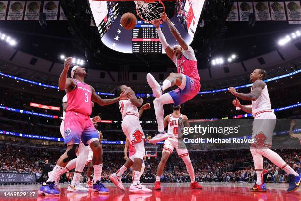 Daniel Gafford of the Washington Wizards celebrates a dunk against the Chicago Bulls during the second half at United Center on February 26, 2023 in...