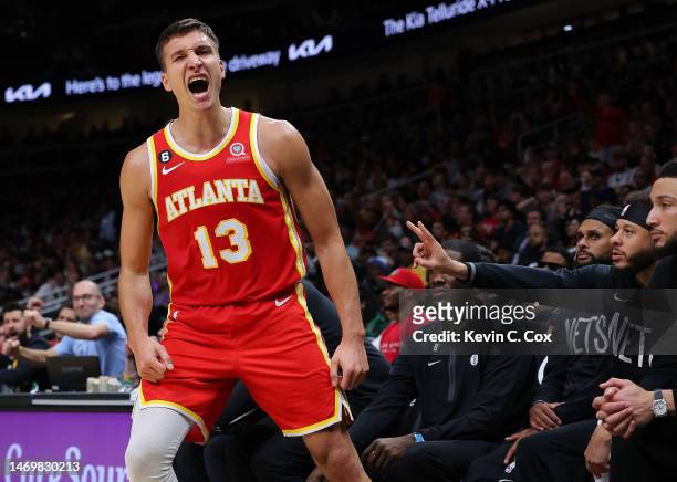 Bogdan Bogdanovic of the Atlanta Hawks reacts after a basket against the Brooklyn Nets during the fourth quarter at State Farm Arena on February 26,...