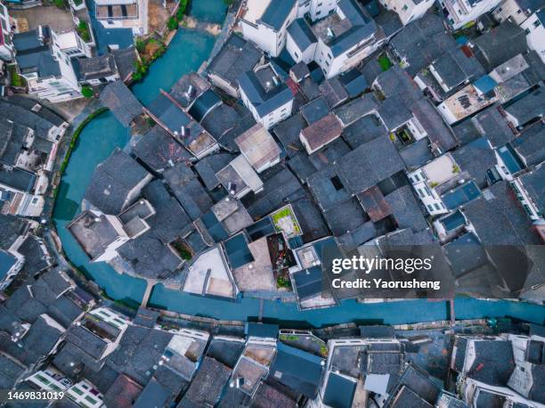 aerial view of chinese traditional ancient village,a river pass through - canal stock pictures, royalty-free photos & images