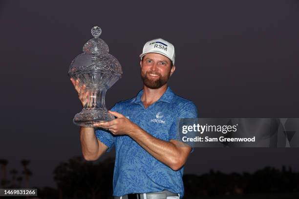 Chris Kirk of the United States stands with the trophy after winning The Honda Classic at PGA National Resort And Spa on February 26, 2023 in Palm...