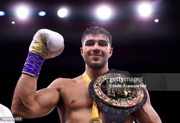 Tommy Fury poses for a photo with their Title Belt after defeating Jake Paul during the Cruiserweight Title fight between Jake Paul and Tommy Fury at...