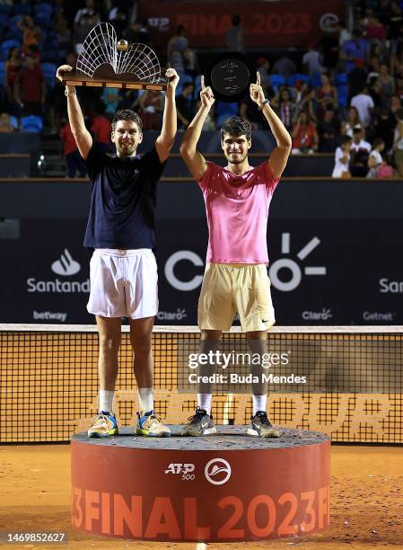 Cameron Norrie of Great Britain poses for photographers with Carlos Alcaraz of Spain after winning the final match of ATP 500 Rio Open presented by...