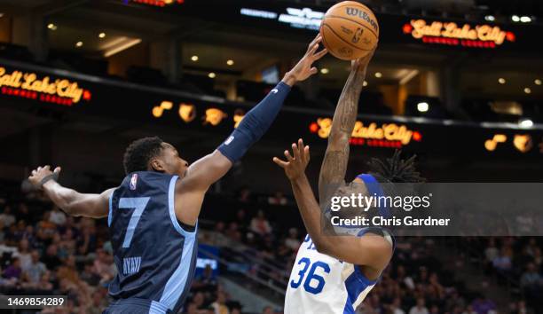Joel Ayayi of the Memphis Grizzlies blocks a shot by DJ Steward of the Philadelphia 76ers during the first half of their NBA Summer League game July...