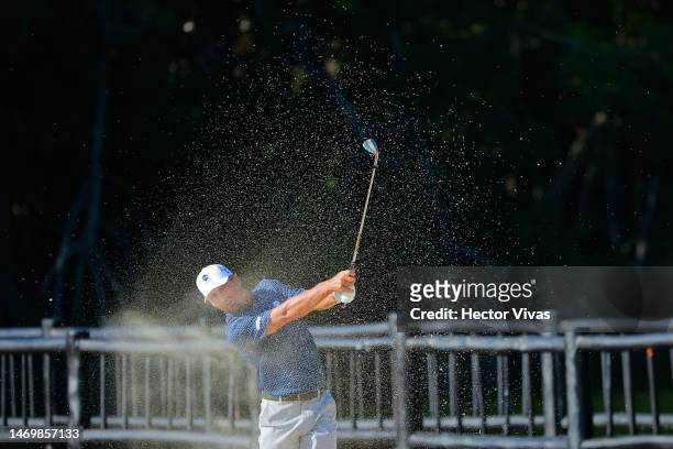 Charles Howell III of Crushers GC plays a shot from a bunker on the 13th hole during day three of the LIV Golf Invitational - Mayakoba at El Camaleon...