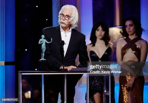 Sam Elliott accepts the Outstanding Performance by a Male Actor in a Television Movie or Limited Series award for “1883” from Jenna Ortega and Aubrey...