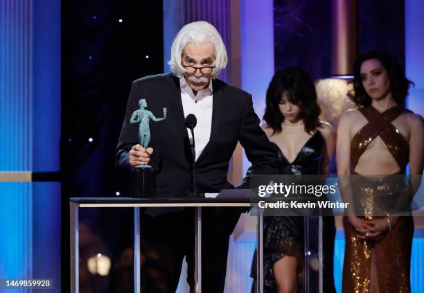 Sam Elliott accepts the Outstanding Performance by a Male Actor in a Television Movie or Limited Series award for “1883” from Jenna Ortega and Aubrey...