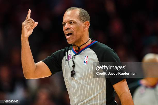 Referee Eric Lewis during the game between the Charlotte Hornets and the Miami Heat at Spectrum Center on February 25, 2023 in Charlotte, North...