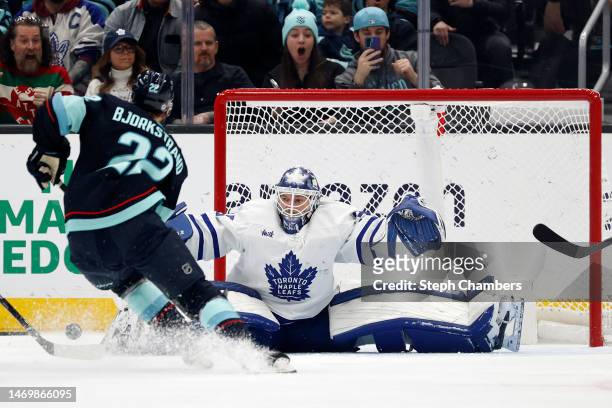 Ilya Samsonov of the Toronto Maple Leafs makes a save against Oliver Bjorkstrand of the Seattle Kraken during the first period at Climate Pledge...