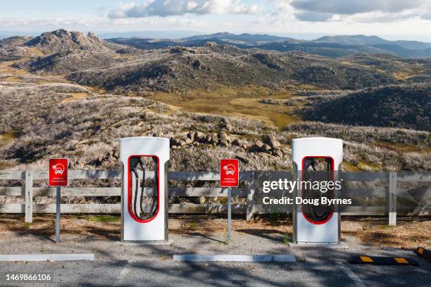 remote electric car charging stations - power plug stockfoto's en -beelden