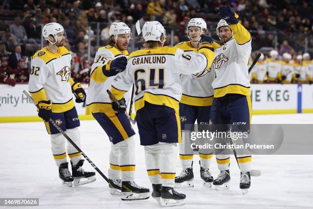 Roman Josi of the Nashville Predators celebrates with Mikael Granlund, Cody Glass, Matt Duchene and Tommy Novak after scoring a power-play goal...