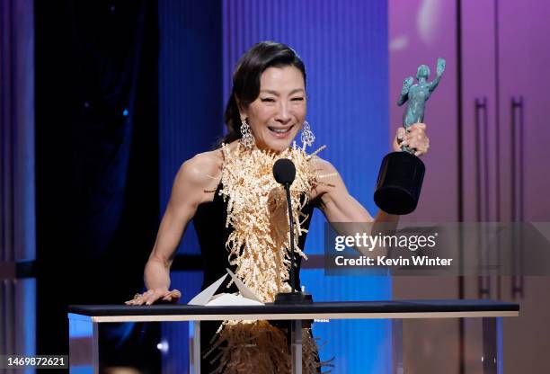 Michelle Yeoh accepts the Outstanding Performance by a Female Actor in a Leading Role for "Everything Everywhere All at Once" onstage during the 29th...