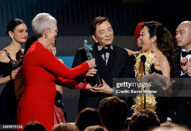 Jenny Slate, Jamie Lee Curtis, James Hong, Michelle Yeoh and Brian Le accept the Outstanding Performance by a Cast in a Motion Picture award for...