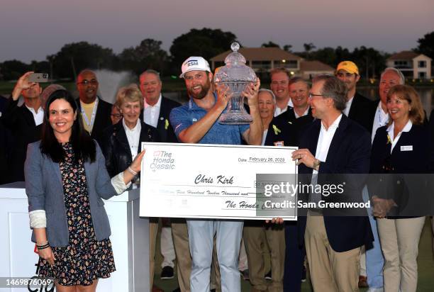 Chris Kirk of the United States stands with the trophy after winning The Honda Classic at PGA National Resort And Spa on February 26, 2023 in Palm...