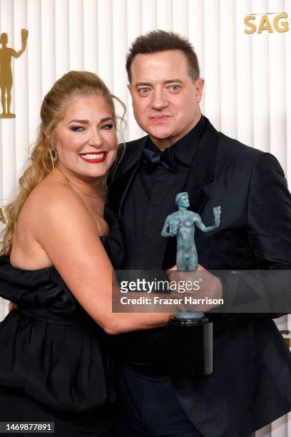 Jeanne Moore and Brendan Fraser, recipient of the Male Actor in a Leading Role award for "The Whale," pose in the press room during the 29th Annual...