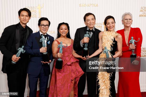 Harry Shum Jr., Ke Huy Quan, Stephanie Hsu, James Hong, Michelle Yeoh, and Jamie Lee Curtis, recipients of the Outstanding Performance by a Cast in a...