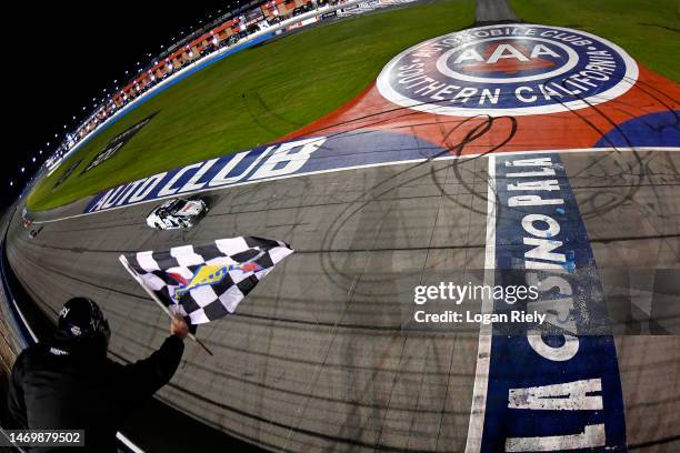 John Hunter Nemechek, driver of the Vons/Albertsons Toyota, takes the checkered flag to win the NASCAR Xfinity Series Production Alliance Group 300...