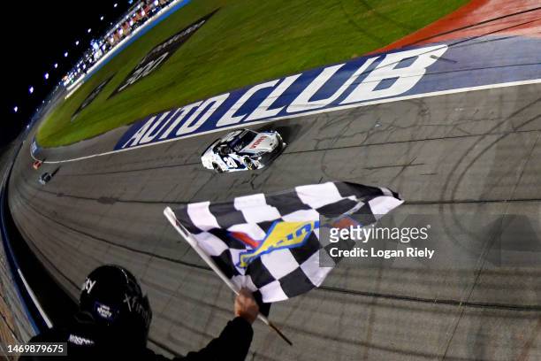 John Hunter Nemechek, driver of the Vons/Albertsons Toyota, takes the checkered flag to win the NASCAR Xfinity Series Production Alliance Group 300...