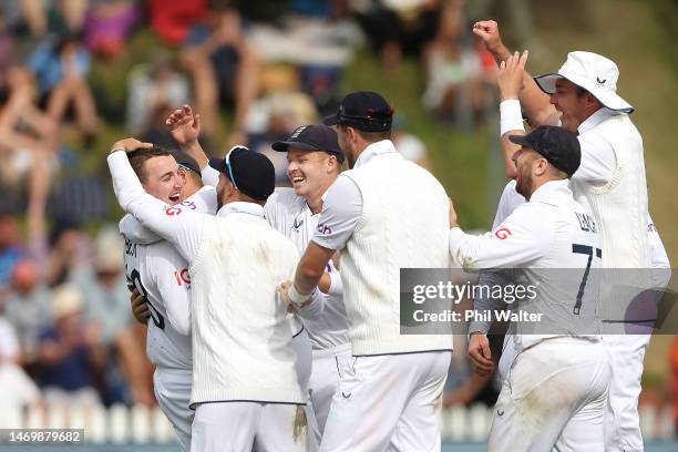 Harry Brook of England celebrates his wicket of Kane Williamson of New Zealand during day four of the Second Test Match between New Zealand and...