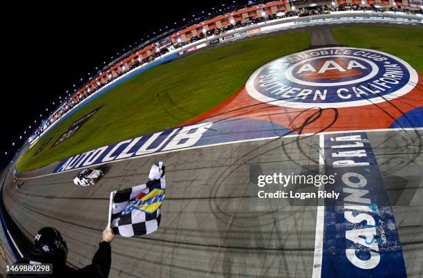 John Hunter Nemechek, driver of the Vons/Albertsons Toyota, takes the checkered flag to win the NASCAR Xfinity Series Production Alliance Group 300...