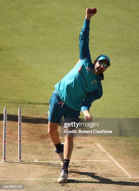 Nathan Lyon of Australia bowls during an Australia Test squad training session at Holkare Stadium on February 27, 2023 in Indore, India.