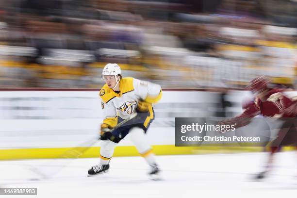 Mark Jankowski of the Nashville Predators skates with the puck during the third period of the NHL game against the Arizona Coyotes at Mullett Arena...
