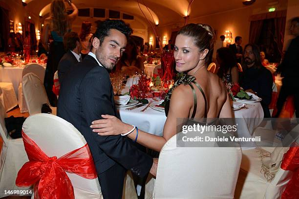 Aaron Diaz and Lola Ponce attend the 'Haiti Charity Gala Event' during the 58th Taormina Film Fest at San Domenico Palace on June 24, 2012 in...