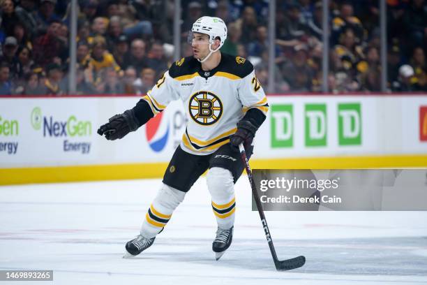 Garnet Hathaway of the Boston Bruins skates up ice during the second period of their NHL game against the Vancouver Canucks at Rogers Arena on...