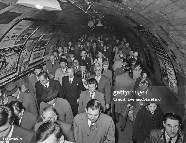 Commuters walking through the tunnels of the Waterloo & City Line as building upgrade work continued at Waterloo Station in London, England, 24th...