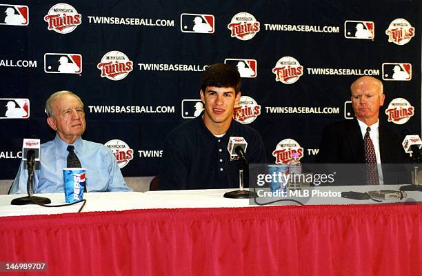 Minnesota Twins owner Carl Pohlad, first overall draft pick Joe Mauer and Minnesota Twins general manager Terry Ryan are seen during a press...