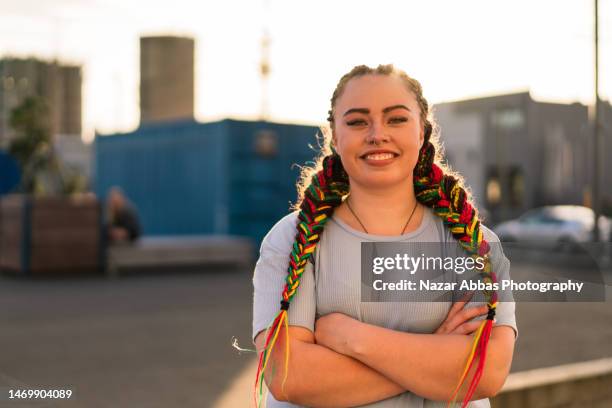 young confident maori woman. - maori tradition stock pictures, royalty-free photos & images