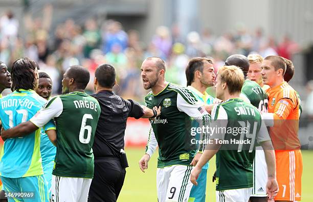 Kris Boyd of the Portland Timbers yells at Freddy Montero of the Seattle Sounders during their game on June 24, 2012 at Jeld-Wen Field in Portland,...