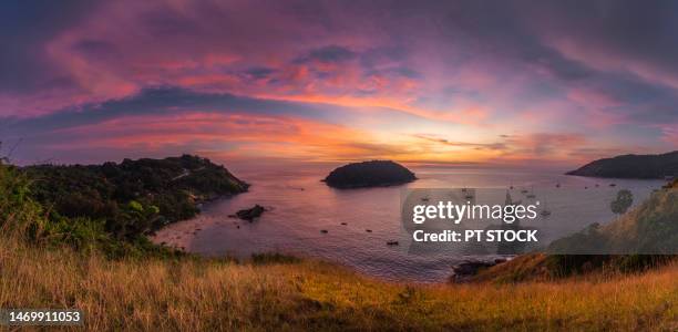 sunset at nui beach, phuket, thailand and there is a twilight light and many ships with many tourists - phuket stock pictures, royalty-free photos & images