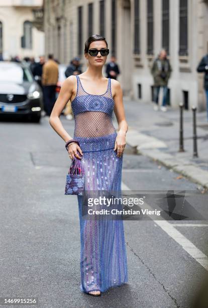 Gabrielle Caunsesil Pozzoli wears net top, skirt, dress outside Giorgio Armani during the Milan Fashion Week Womenswear Fall/Winter 2023/2024 on...