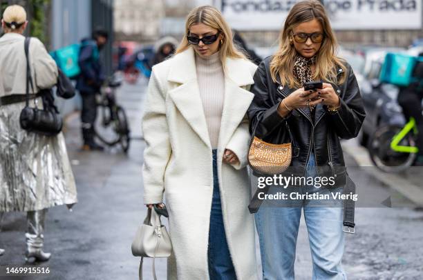 Teresa Jg wears creme white coat, denim jeans, Polene bag, turtleneck & Maxime Moeckl wears leather jacket, denim jeans, pointed heels, bag, animal...