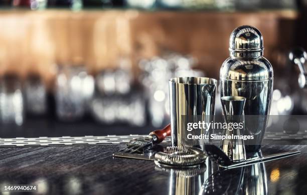 barmans tools, cocktail shaker and classic equipment for preparing drinks. - cocktail shaker stock pictures, royalty-free photos & images