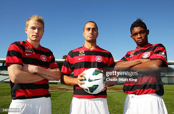 New signings Aaron Mooy, Tarek Elrich and Kwabena Appiah-Kubi pose in the new playing strip during the launch of the new A-League team, Western...