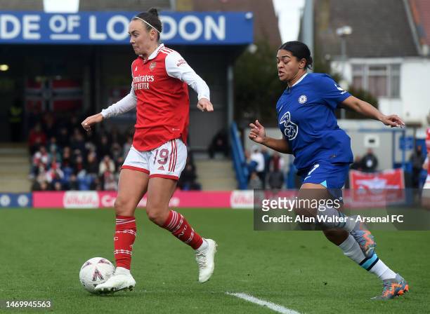 Caitlin Foord of Arsenal takes on Jess Carter of Chelsea during the WSL match between Chelsea Women and Arsenal Women at Kingsmeadow on February 26,...