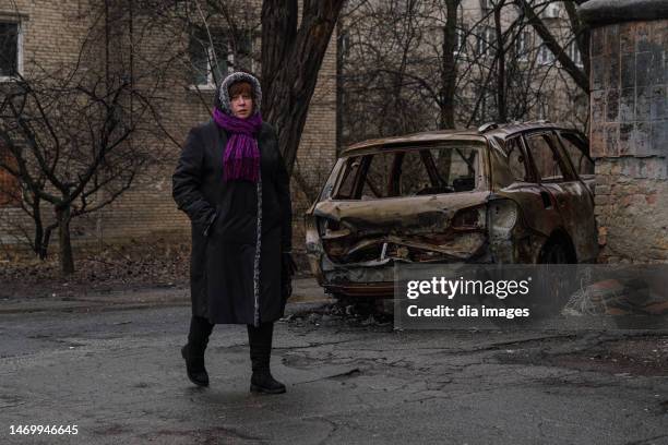 Ukrainian residents of Mariupol are seen carrying on with daily life on the damaged streets on February 26, 2023 in Mariupol, Ukraine. Mariupol was...