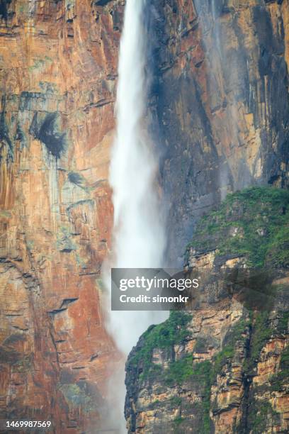 waterfall flowing over mountain - venezuela aerial stock pictures, royalty-free photos & images