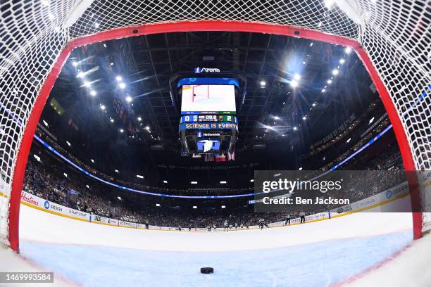 The puck slides through the crease after an attempted empty net goal by the Minnesota Wild in the third period of a game between the Columbus Blue...