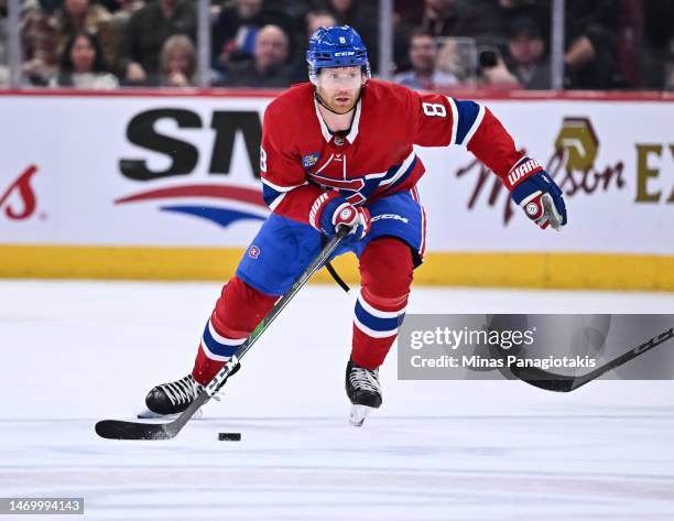 Mike Matheson of the Montreal Canadiens skates the puck during the second period against the Ottawa Senators at Centre Bell on February 25, 2023 in...