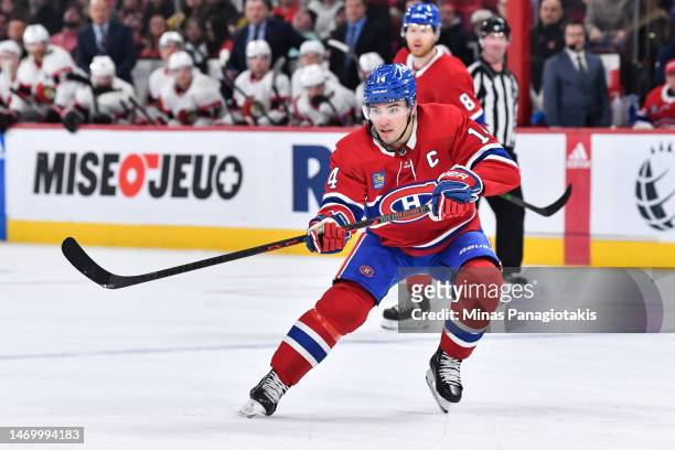 Nick Suzuki of the Montreal Canadiens skates during the second period against the Ottawa Senators at Centre Bell on February 25, 2023 in Montreal,...