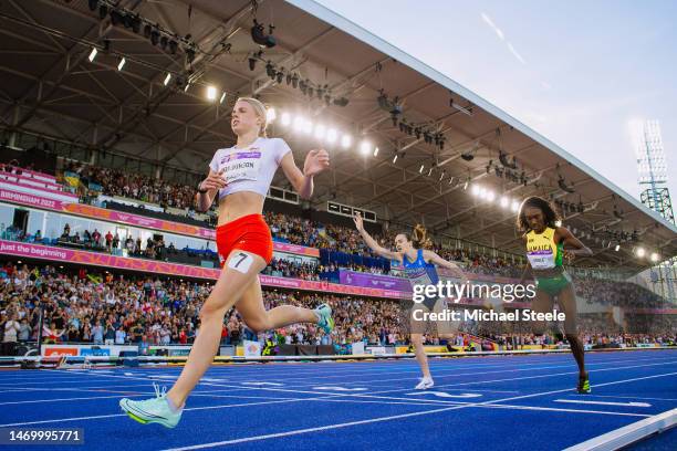 Keely Hodgkinson crosses the finishing line to claim silver from Scotland's Laura Muir in the women's 800m final on day nine of the Commonwealth...