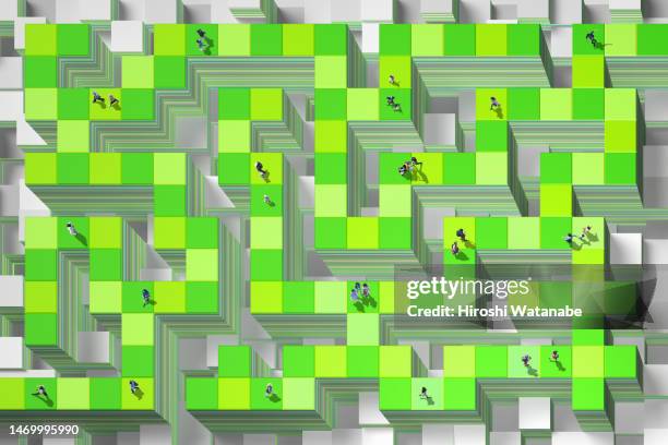 people walking in a maze connected by blockchain - escaping maze stock pictures, royalty-free photos & images