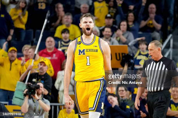 Hunter Dickinson of the Michigan Wolverines reacts against the Wisconsin Badgers at Crisler Arena on February 26, 2023 in Ann Arbor, Michigan.