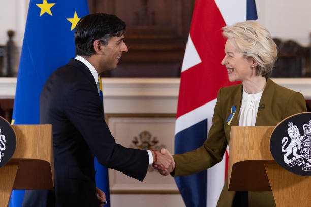Prime Minister Rishi Sunak and EU Commission President Ursula von der Leyen shake hands as they hold a press conference at Windsor Guildhall on...