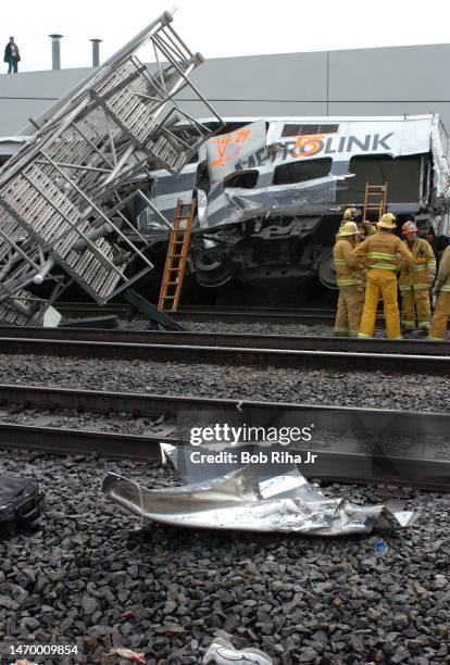 Los Angeles County Sheriff deputies, firefighters and Federal Investigators on scene of train crash between a Metrolink communter train and a...