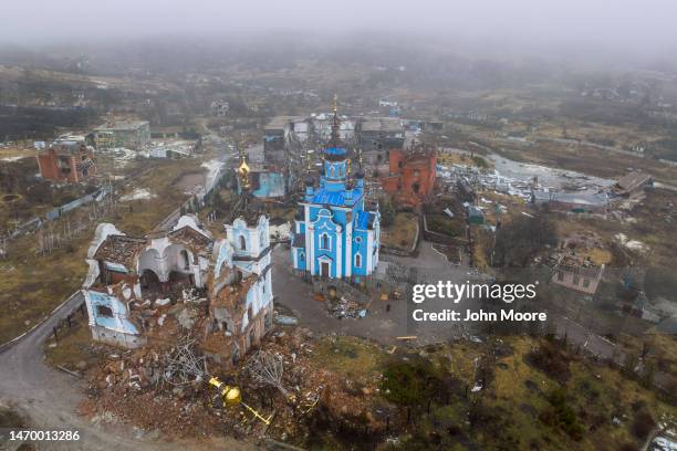 As seen from an aerial view, an Orthodox church stands in ruins on February 27, 2023 in Bogorodychne, in the Donbas region of eastern Ukraine. The...