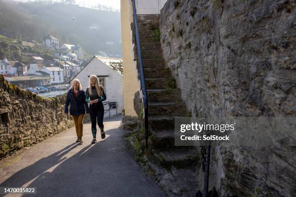 exploring polperro together - walker stock pictures, royalty-free photos & images