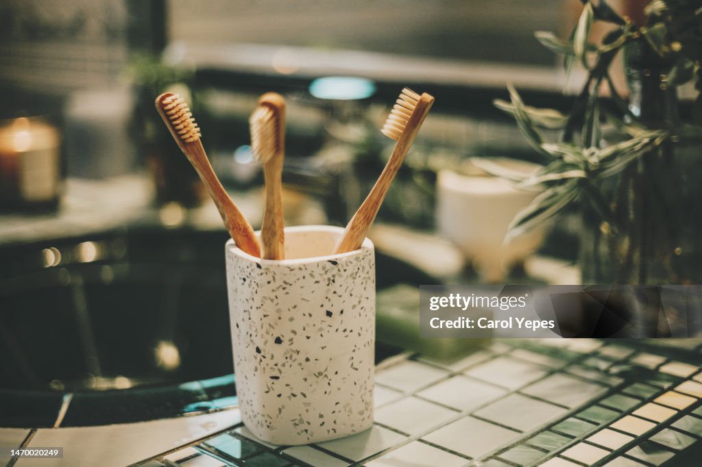 Bamboo toothbrush in a bathroom